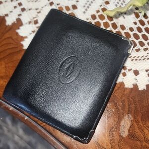 Cartier Black Leather Bifold Wallet with Silver Corner Accents. No Callouts